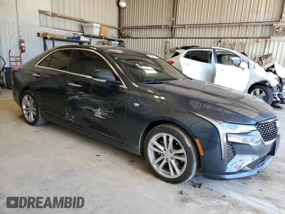 ✅ 2022 Cadillac CT4 Luxury • VIN: 1G6DJ5RK3N0113628 • Лот: 55824815. Опубликован ранее на Copart с пробегом 33 425 миль. Бесплатный доступ к архиву аукционных продаж из США и подробный отчёт об истории автомобиля на DreamBid. Изображение 4.