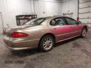 ✅ 2000 Chrysler LHS • VIN: 2C3HC56G9YH327598 • Lot: 42721520. Listed on IAAI with 141,235 mi. Free auction sales archive from the USA and detailed vehicle history report at DreamBid. Image 4.