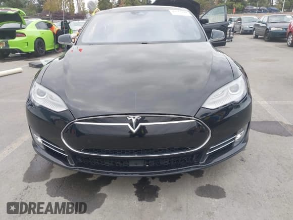 ✅ 2015 Tesla Model S 85 • VIN: 5YJSA1E16FF107254 • Lot: 43741109. Listed on IAAI with 119,933 mi. Free auction sales archive from the USA and detailed vehicle history report at DreamBid. Image 13.