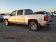 ✅ 2018 Chevrolet Silverado 1500 LT • VIN: 3GCUKREC6JG425562 • Лот: 82734105. Опубликован ранее на Copart с пробегом 143 221 миль. Бесплатный доступ к архиву аукционных продаж из США и подробный отчёт об истории автомобиля на DreamBid. Изображение 2.