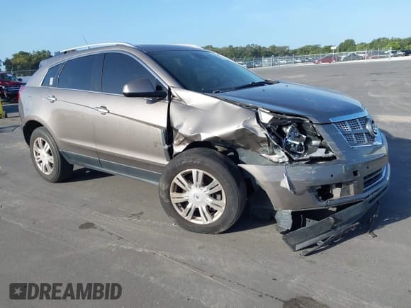 ✅ 2011 Cadillac SRX Luxury Collection • VIN: 3GYFNAEY0BS680505 • Lot: 43376121. Listed on IAAI with 214,929 mi. Free auction sales archive from the USA and detailed vehicle history report at DreamBid. Image 1.