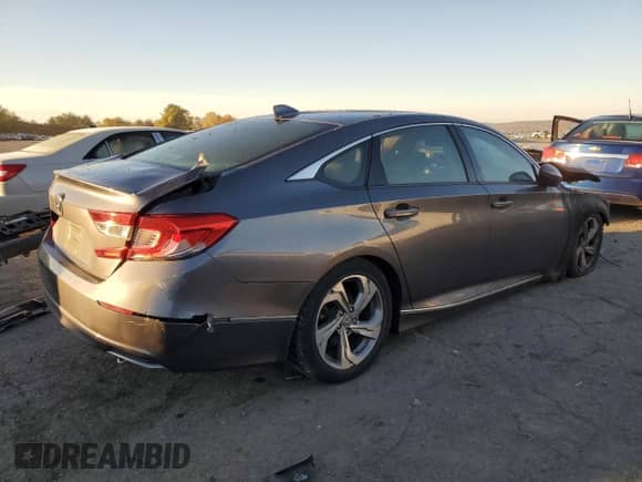 2018 Honda Accord EX-L z VIN 1HGCV1F5XJA140710, wystawiony jako Copart lot #89456795 z przebiegiem Nie podano mil oraz Szkoda całkowita • Salvage title. Historia ofert i sprzedaży dostępna na DreamBid. Obrazek 3.