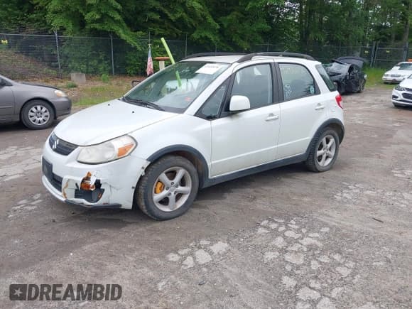 ✅ 2007 Suzuki SX4 • VIN: JS2YB413975108407 • Lot: 42422076. Wystawiony na IAAI z przebiegiem 160 697 mil. Bezpłatny archiwum sprzedaży aukcyjnych z USA i szczegółowy raport historii pojazdu na DreamBid. Zdjęcie 2.