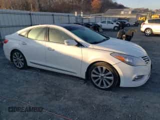 2013 Hyundai Azera z VIN KMHFH4JG8DA260471, wystawiony jako Copart lot #79233704 z przebiegiem 120 515 mil mil oraz Szkoda całkowita • Salvage title. Historia ofert i sprzedaży dostępna na DreamBid. Obrazek 4.