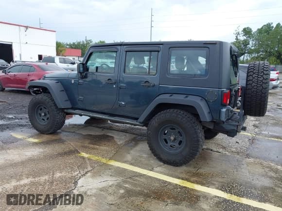 ✅ 2008 Jeep Wrangler Unlimited X • VIN: 1J4GA39198L529900 • Lot: 43056730. Listed on IAAI with 145,039 mi. Free auction sales archive from the USA and detailed vehicle history report at DreamBid. Image 3.