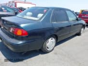 ✅ 1999 Toyota Corolla VE • VIN: 1NXBR12E4XZ251809 • Lot: 42910359. Listed on IAAI with 150,200 mi. Free auction sales archive from the USA and detailed vehicle history report at DreamBid. Image 4.