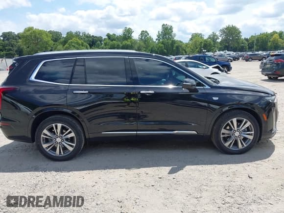 ✅ 2022 Cadillac XT6 Premium Luxury • VIN: 1GYKPCRSXNZ103675 • Lot: 42934957. Listed on IAAI with 36,729 mi. Free auction sales archive from the USA and detailed vehicle history report at DreamBid. Image 13.