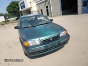 ✅ 1995 Toyota Tercel DX • VIN: JT2EL56DXS0076213 • Lot: 60622915. Listed on Copart with 206,968 mi. Free auction sales archive from the USA and detailed vehicle history report at DreamBid. Image 13.
