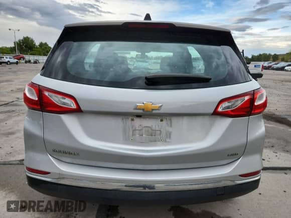 2018 Chevrolet Equinox LS с VIN 2GNAXREV8J6127216, выставлен на аукционе Copart как лот 71858945 с пробегом 40 204 миль миль и Списание • Salvage title. История ставок и продаж доступна на DreamBid. Изображение 6.