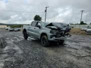 ✅ 2024 Chevrolet Silverado 1500 Custom Trail Boss • VIN: 3GCPDCEK4RG444425 • Lot: 81301885. Wystawiony na Copart z przebiegiem Nie podano. Bezpłatny archiwum sprzedaży aukcyjnych z USA i szczegółowy raport historii pojazdu na DreamBid. Zdjęcie 13.