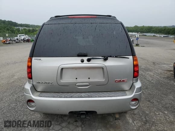 ✅ 2006 GMC Envoy SLE • VIN: 1GKET16S566124495 • Lot: 58792765. Listed on Copart with 186,867 mi. Free auction sales archive from the USA and detailed vehicle history report at DreamBid. Image 6.