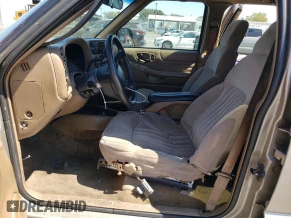 2002 Chevrolet Blazer LS z VIN 1GNDT13W22K190722, wystawiony jako Copart lot #68576164 z przebiegiem 124 420 mil mil oraz Szkoda całkowita • Salvage title. Historia ofert i sprzedaży dostępna na DreamBid. Obrazek 7.