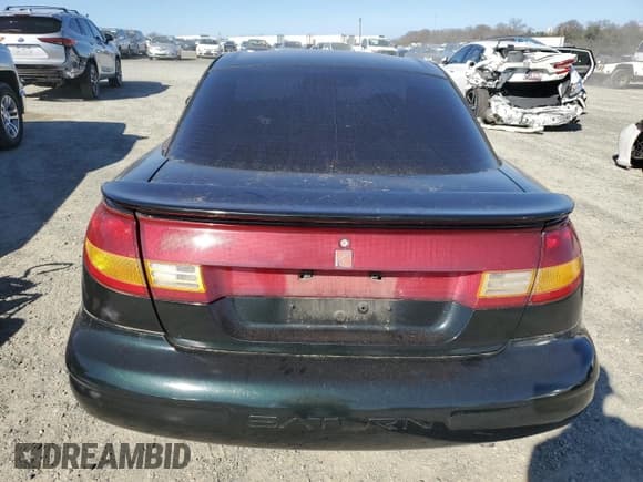 ✅ 1997 Saturn SC • VIN: 1G8ZF1286VZ266912 • Лот: 46953875. Опубликован ранее на Copart с пробегом 149 017 миль. Бесплатный доступ к архиву аукционных продаж из США и подробный отчёт об истории автомобиля на DreamBid. Изображение 6.