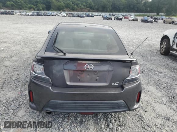 ✅ 2016 Scion tC • VIN: JTKJF5C73GJ025254 • Лот: 69270645. Опубликован ранее на Copart с пробегом 93 862 миль. Бесплатный доступ к архиву аукционных продаж из США и подробный отчёт об истории автомобиля на DreamBid. Изображение 6.