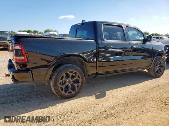 2024 Ram 1500 Limited with VIN 1C6SRFHTXRN153220, listed as a Copart auction lot 61267535 with 22,490 mi miles and Salvage title. Bid and sale history available at DreamBid. Image 3.