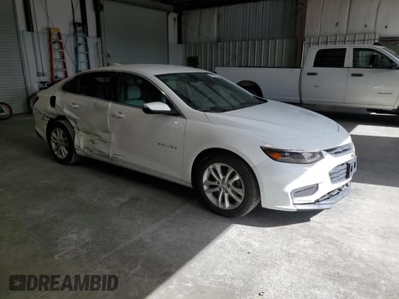 ✅ 2018 Chevrolet Malibu LT • VIN: 1G1ZD5STXJF124865 • Lot: 91227205. Listed on Copart with 73,625 mi. Free auction sales archive from the USA and detailed vehicle history report at DreamBid. Image 4.