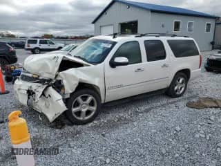 2013 Chevrolet Suburban LTZ с VIN 1GNSKKE72DR191773, выставлен на аукционе Copart как лот 87201895 с пробегом 210 253 миль миль и Списание • Salvage title. История ставок и продаж доступна на DreamBid. Изображение 1.