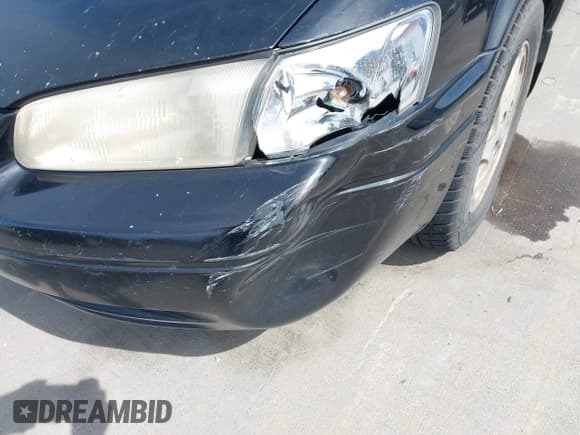 ✅ 1998 Toyota Camry LE • VIN: JT2BF28KXW0118504 • Lot: 42096672. Listed on IAAI with 257,358 mi. Free auction sales archive from the USA and detailed vehicle history report at DreamBid. Image 17.