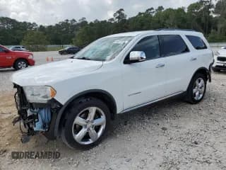 ✅ 2013 Dodge Durango Citadel • VIN: 1C4SDHET0DC617451 • Lot: 54627075. Listed on Copart with 139,414 mi. Free auction sales archive from the USA and detailed vehicle history report at DreamBid. Image 1.