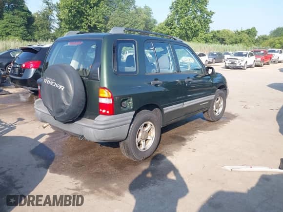 1999 Chevrolet Tracker z VIN 2CNBJ13C9X6928226, wystawiony jako IAAI lot #42824297 z przebiegiem 109 075 mil mil oraz . Historia ofert i sprzedaży dostępna na DreamBid. Obrazek 4.