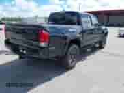 2022 Toyota Tacoma SR5 with VIN 3TMAZ5CN4NM164094, listed as a IAAI auction lot 43409274 with 38,585 mi miles and . Bid and sale history available at DreamBid. Image 4.