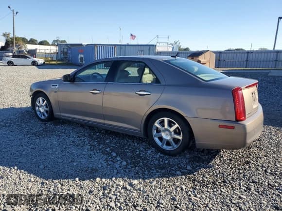 ✅ 2008 Cadillac STS RWD • VIN: 1G6DW67V080138074 • Lot: 91199245. Listed on Copart with 125,034 mi. Free auction sales archive from the USA and detailed vehicle history report at DreamBid. Image 2.