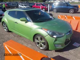 ✅ 2012 Hyundai Veloster w/Gray Int • VIN: KMHTC6AD1CU050309 • Lot: 43214357. Wystawiony na IAAI z przebiegiem 157 778 mil. Bezpłatny archiwum sprzedaży aukcyjnych z USA i szczegółowy raport historii pojazdu na DreamBid. Zdjęcie 1.