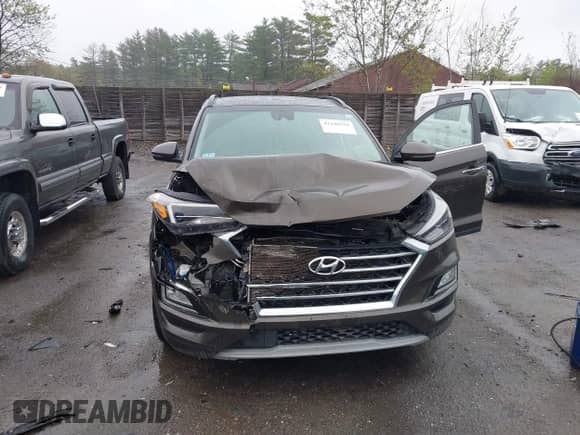 2020 Hyundai Tucson SEL with VIN KM8J33AL0LU158207, listed as a IAAI auction lot 42140154 with 105,216 mi miles and . Bid and sale history available at DreamBid. Image 12.