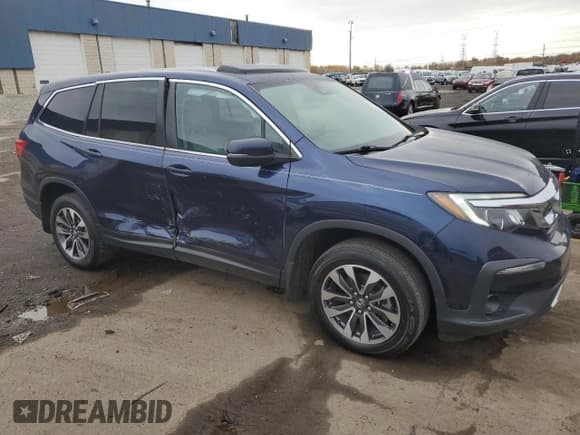 ✅ 2021 Honda Pilot EX-L • VIN: 5FNYF6H53MB003292 • Lot: 91077775. Listed on Copart with 103,677 mi. Free auction sales archive from the USA and detailed vehicle history report at DreamBid. Image 4.
