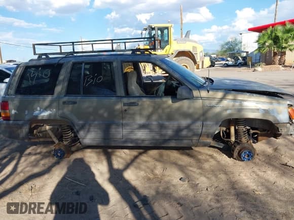 ✅ 1995 Jeep Grand Cherokee Laredo • VIN: 1J4GZ58S9SC569349 • Lot: 43305892. Listed on IAAI with 209,279 mi. Free auction sales archive from the USA and detailed vehicle history report at DreamBid. Image 12.
