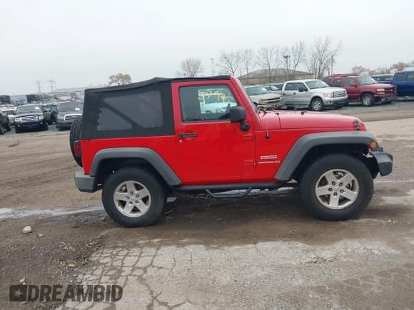 ✅ 2010 Jeep Wrangler Sport • VIN: 1J4AA2D12AL100434 • Лот: 43740797. Опубликован ранее на IAAI с пробегом 176 384 миль. Бесплатный доступ к архиву аукционных продаж из США и подробный отчёт об истории автомобиля на DreamBid. Изображение 13.