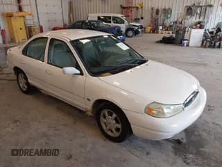 ✅ 1999 Ford Contour SE • VIN: 1FAFP6634XK138025 • Лот: 42436185. Опубликован ранее на IAAI с пробегом 90 226 миль. Бесплатный доступ к архиву аукционных продаж из США и подробный отчёт об истории автомобиля на DreamBid. Изображение 1.