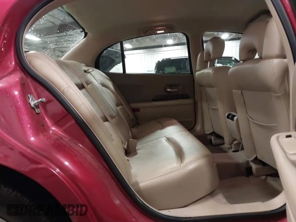 ✅ 2005 Buick LeSabre Limited • VIN: 1G4HR54K35U228300 • Lot: 42341624. Wystawiony na IAAI z przebiegiem 153 945 mil. Bezpłatny archiwum sprzedaży aukcyjnych z USA i szczegółowy raport historii pojazdu na DreamBid. Zdjęcie 8.