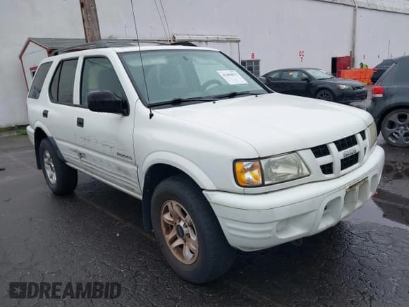 ✅ 2004 Isuzu Rodeo S • VIN: 4S2CK58Y244308949 • Lot: 41696812. Listed on IAAI with 132,894 mi. Free auction sales archive from the USA and detailed vehicle history report at DreamBid. Image 1.