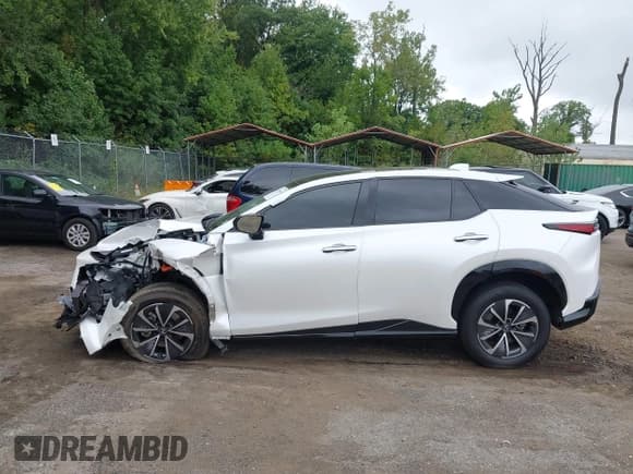 ✅ 2024 Lexus RZ 300e Premium • VIN: JTJABABB1RA006333 • Lot: 43139456. Listed on IAAI with 11,816 mi. Free auction sales archive from the USA and detailed vehicle history report at DreamBid. Image 13.