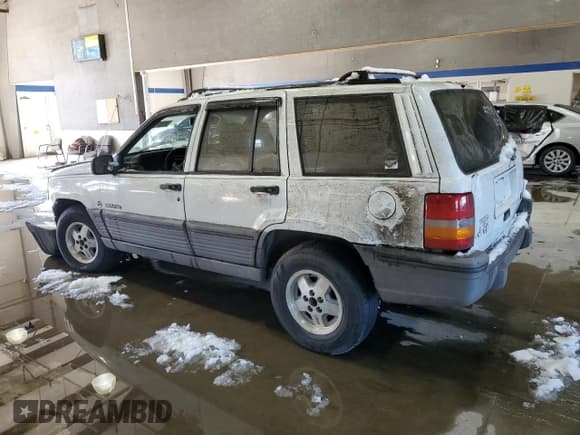 ✅ 1993 Jeep Grand Cherokee Laredo • VIN: 1J4GZ58Y2PC658787 • Lot: 41687765. Listed on Copart with 166,262 mi. Free auction sales archive from the USA and detailed vehicle history report at DreamBid. Image 2.