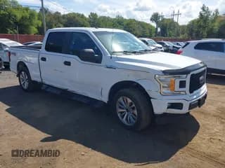 ✅ 2018 Ford F-150 XL • VIN: 1FTFW1E55JFC94500 • Lot: 43122542. Listed on IAAI with 92,957 mi. Free auction sales archive from the USA and detailed vehicle history report at DreamBid. Image 1.