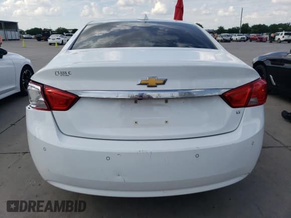 ✅ 2014 Chevrolet Impala LT • VIN: 1G1125S38EU119782 • Лот: 59880144. Опубликован ранее на Copart с пробегом 184 390 миль. Бесплатный доступ к архиву аукционных продаж из США и подробный отчёт об истории автомобиля на DreamBid. Изображение 6.