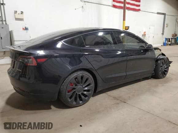 ✅ 2023 Tesla Model 3 Performance • VIN: 5YJ3E1EC5PF589940 • Лот: 90488905. Опубликован ранее на Copart с пробегом 28 562 миль. Бесплатный доступ к архиву аукционных продаж из США и подробный отчёт об истории автомобиля на DreamBid. Изображение 3.
