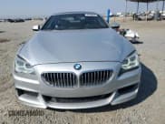 ✅ 2013 BMW 6 Series 650i • VIN: WBAYM9C51DDW20225 • Лот: 67766635. Опубликован ранее на Copart с пробегом 165 045 миль. Бесплатный доступ к архиву аукционных продаж из США и подробный отчёт об истории автомобиля на DreamBid. Изображение 5.