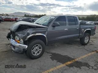 ✅ 2003 Dodge Dakota SLT • VIN: 1D7HG48N83S146943 • Lot: 89734435. Listed on Copart with 193,446 mi. Free auction sales archive from the USA and detailed vehicle history report at DreamBid. Image 1.
