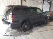 ✅ 2014 Chevrolet Tahoe Commercial • VIN: 1GNLC2E07ER213191 • Lot: 43243599. Listed on IAAI with 141,185 mi. Free auction sales archive from the USA and detailed vehicle history report at DreamBid. Image 4.