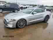 2021 Ford Mustang EcoBoost with VIN 1FA6P8TH7M5137392, listed as a Copart auction lot 64767285 with 100,212 mi miles and Salvage title. Bid and sale history available at DreamBid. Image 1.