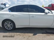 ✅ 2015 Infiniti Q50 • VIN: JN1BV7AR5FM393594 • Лот: 42964884. Опубликован ранее на IAAI с пробегом 134 536 миль. Бесплатный доступ к архиву аукционных продаж из США и подробный отчёт об истории автомобиля на DreamBid. Изображение 13.