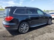 ✅ 2015 Mercedes-Benz GL 450 • VIN: 4JGDF6EE5FA452404 • Лот: 65478405. Опубликован ранее на Copart с пробегом 143 897 миль. Бесплатный доступ к архиву аукционных продаж из США и подробный отчёт об истории автомобиля на DreamBid. Изображение 3.