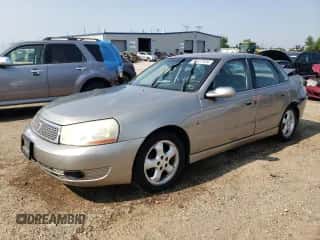 2003 Saturn LS z VIN 1G8JU54F63Y520157, wystawiony jako Copart lot #65477434 z przebiegiem 130 515 mil mil oraz Szkoda całkowita • Salvage title. Historia ofert i sprzedaży dostępna na DreamBid. Obrazek 1.