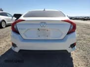 ✅ 2018 Honda Civic EX • VIN: 19XFC2F8XJE207790 • Лот: 87088405. Опубликован ранее на Copart с пробегом 62 981 миль. Бесплатный доступ к архиву аукционных продаж из США и подробный отчёт об истории автомобиля на DreamBid. Изображение 6.