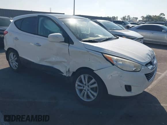 2012 Hyundai Tucson GLS z VIN KM8JU3AC3CU461964, wystawiony jako IAAI lot #43511864 z przebiegiem 113 173 mil mil oraz . Historia ofert i sprzedaży dostępna na DreamBid. Obrazek 1.