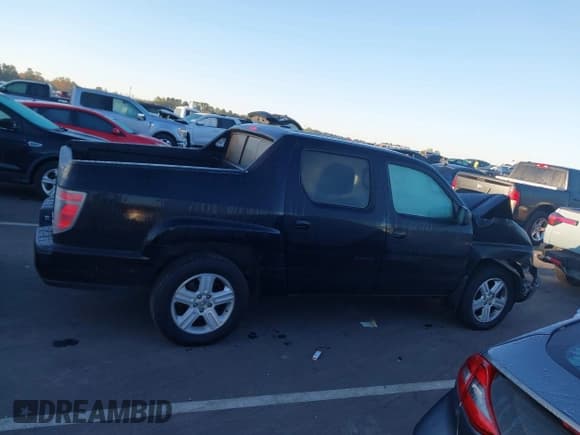 ✅ 2012 Honda Ridgeline RTL • VIN: 5FPYK1F59CB453794 • Лот: 43490365. Опубликован ранее на IAAI с пробегом 162 704 миль. Бесплатный доступ к архиву аукционных продаж из США и подробный отчёт об истории автомобиля на DreamBid. Изображение 13.