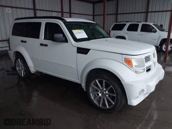2008 Dodge Nitro R/T with VIN 1D8GT58638W218746, listed as a IAAI auction lot 42200153 with 186,676 mi miles and . Bid and sale history available at DreamBid. Image 1.